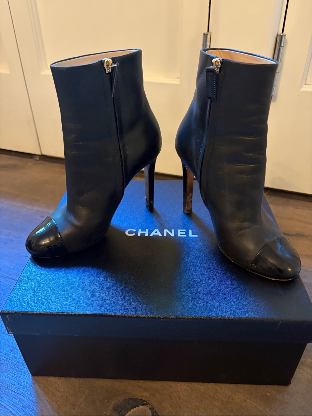 CHANEL Black Leather Ankle Booties with Patent Cap Toe